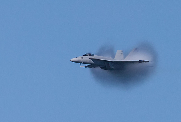 Jet at the moment of breaking the sound barrier. Fleet Week.